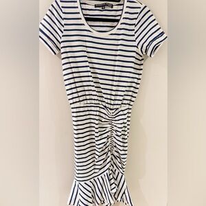 Veronica Beard Navy and White Striped dress with ruched ruffle skirt.
